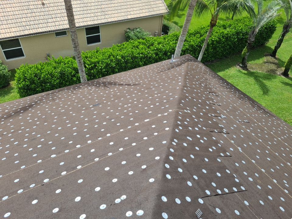Residential Roofing Installation using 1" Nail strip metal roof by BLUES BROTHERS ROOFING