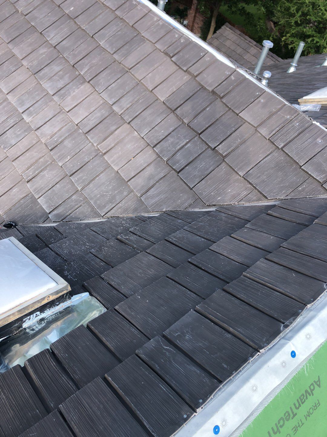 Designer Residential Roof with Zip System by Springtree Restoration