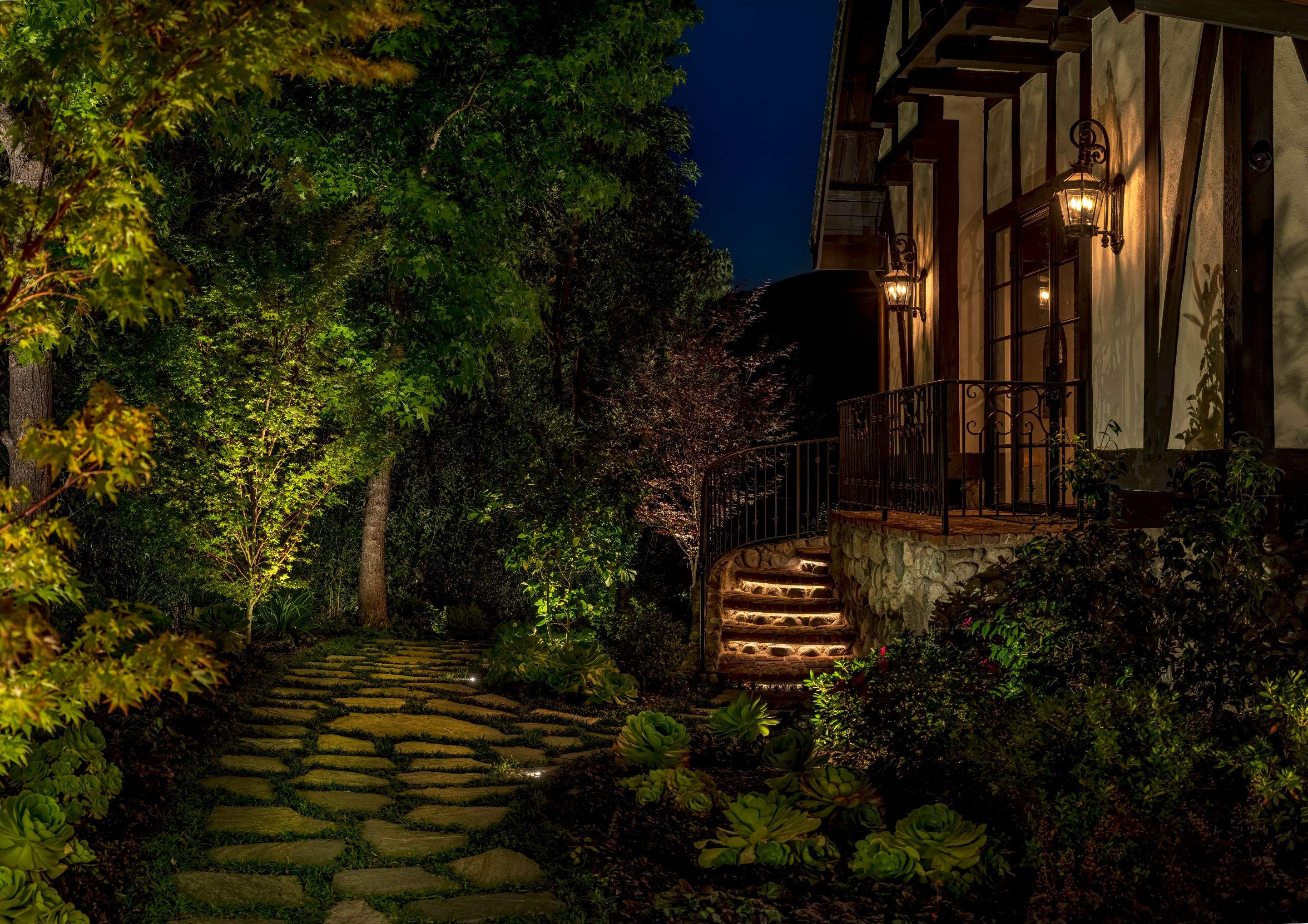 Tudor Estate Landscape Lighting with Integrated Stone Step Illumination by Outdoor Lights + Shades