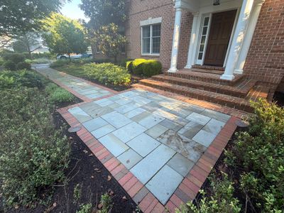 Composite Deck and Stone Paver Walkway power washing.