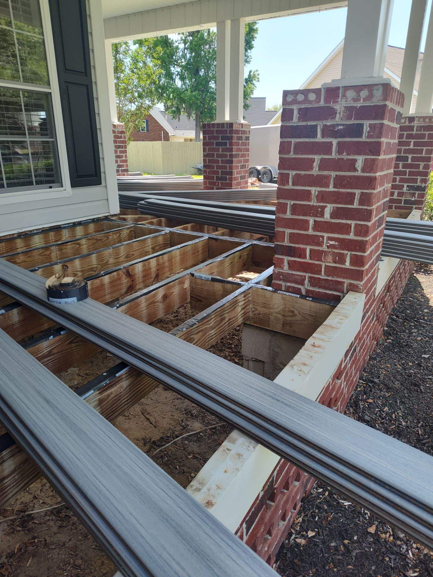 Outside porch and concreate work by Cornerstone Home Builders, LLC