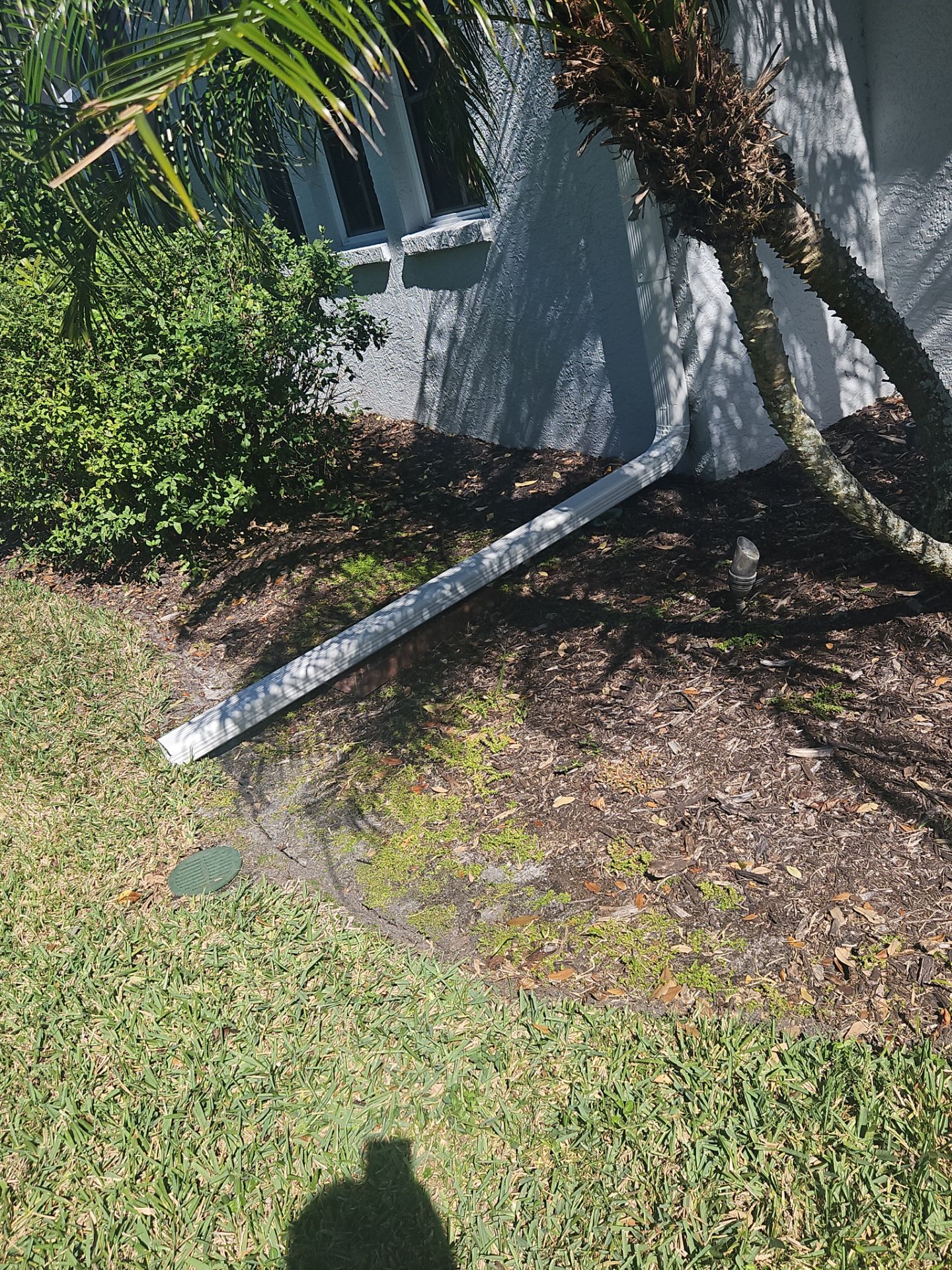 White Down Spouts using downspouts and White Seamless Gutters in Sarasota FL by Gutter Professors