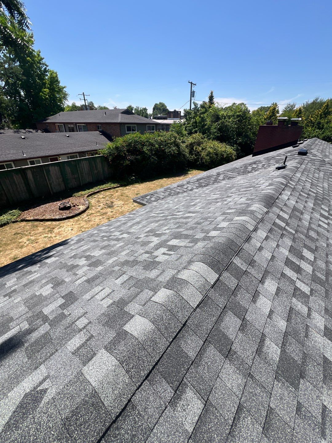 Residential Roofing Installation using IKO Dynasty (Color: Summit Grey) by Orezona Building & Roofing Company, Inc.