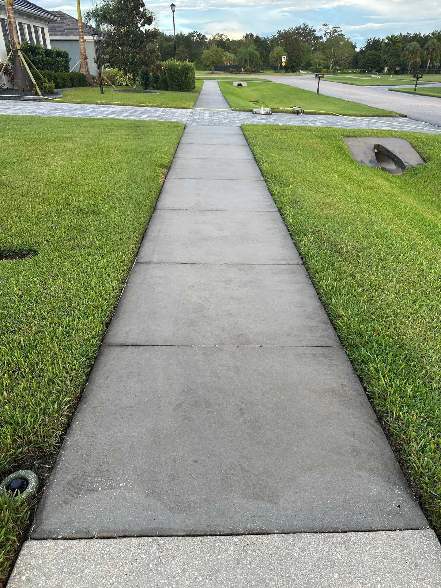 Paver Driveway, Sidewalk, and Culvert Cleaning in Winding River Community, Bradenton, FL by Sunshine AquaWash