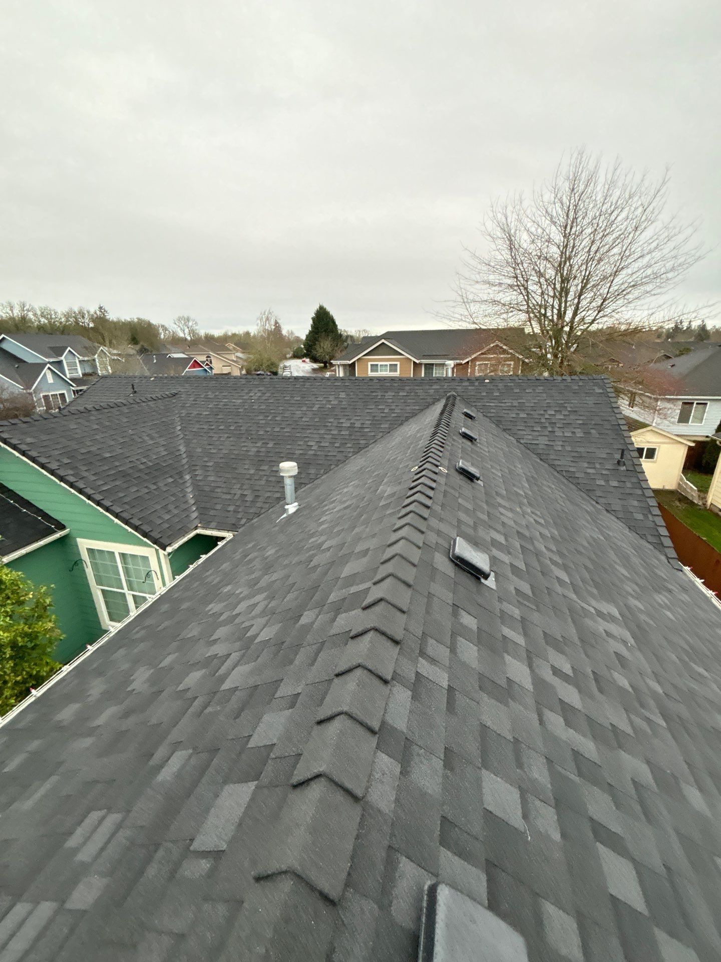 Residential Roofing Installation using IKO Dynasty (Color: Granite Black) by Orezona Building & Roofing Company, Inc.