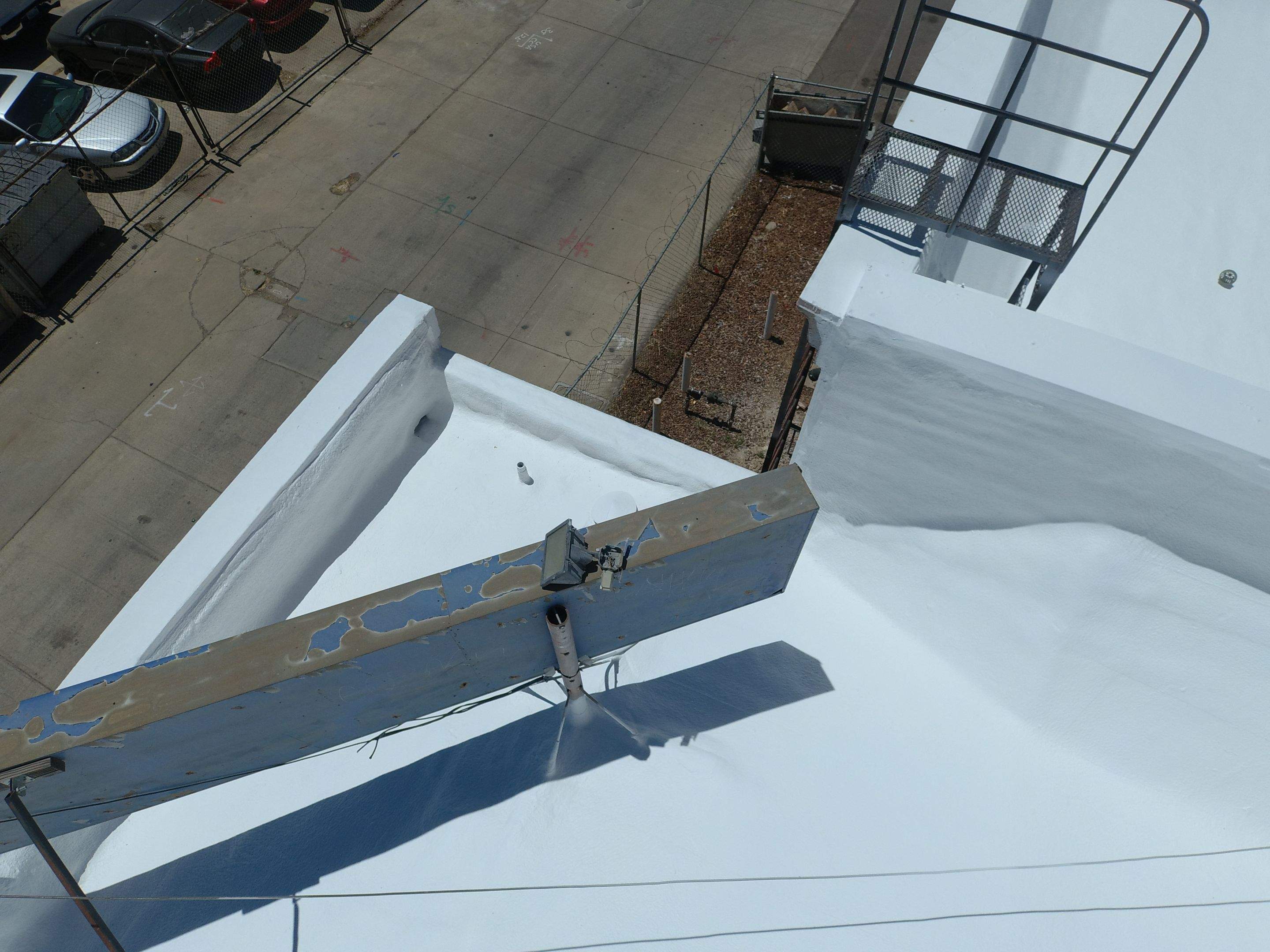 Spray foam and coatings using Conklin Benchmark/PUMA XL coatings and spray foam by Straight Edge Roofing Inc