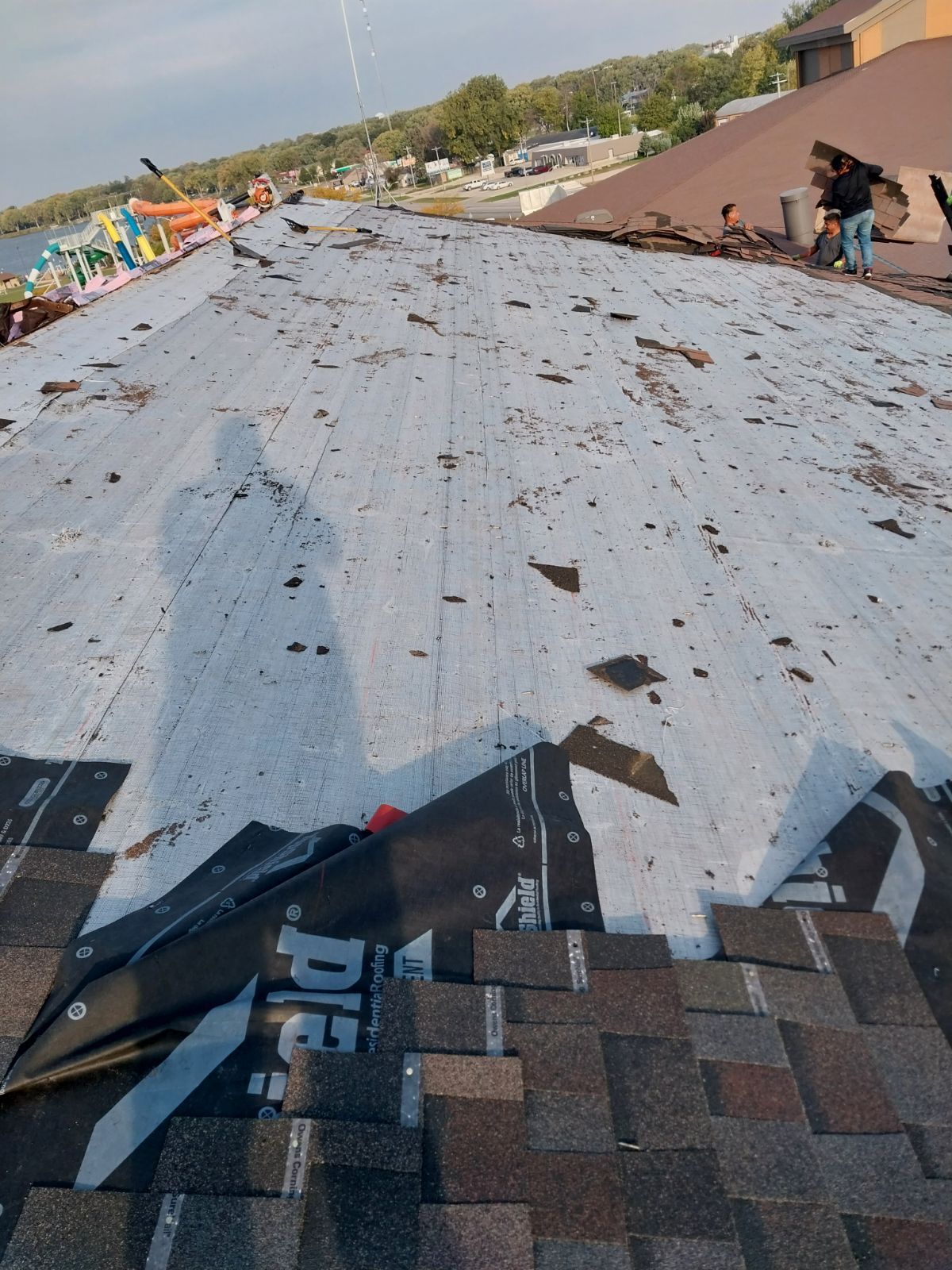 Commercial Roofing Installation using Shingles by Grell Roofing, LLC