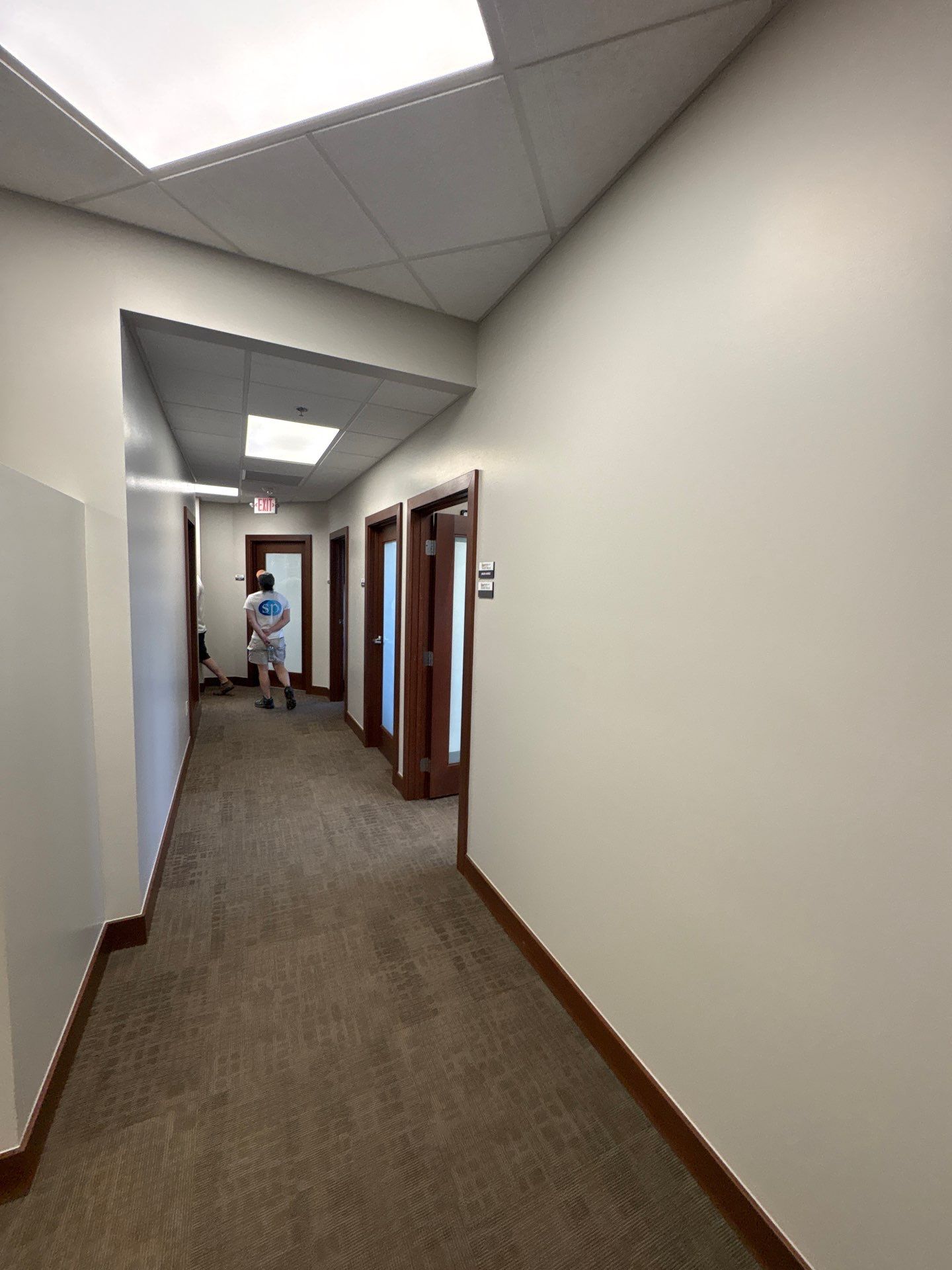 Commercial Office Interior Remodel and Modern Suite Refresh in Sioux Falls by Select Painting, Coatings & Garage Cabinets
