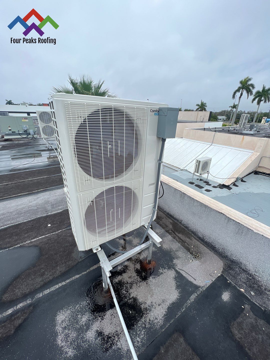 Commercial Roofing Repair using Roof Sealant by Four Peaks Roofing