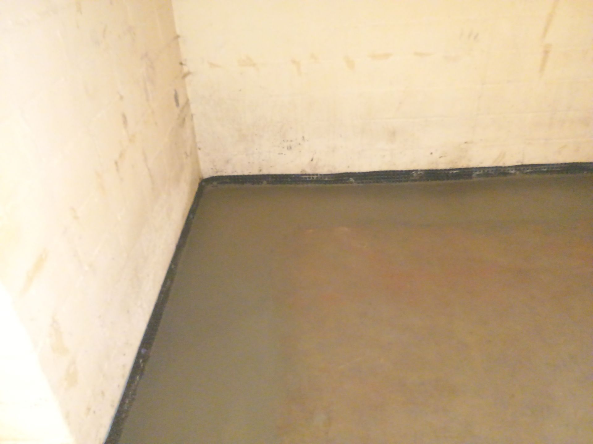 Interior Drain Tile & Sump Pump System in North Minneapolis by Waterproofing Northeast
