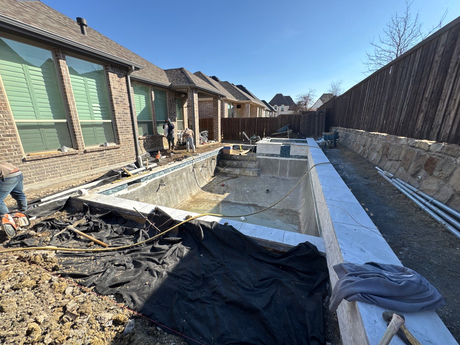 Geometric Pool with Raised Stone Spa by Pinnacle Pools and Spas - DFW