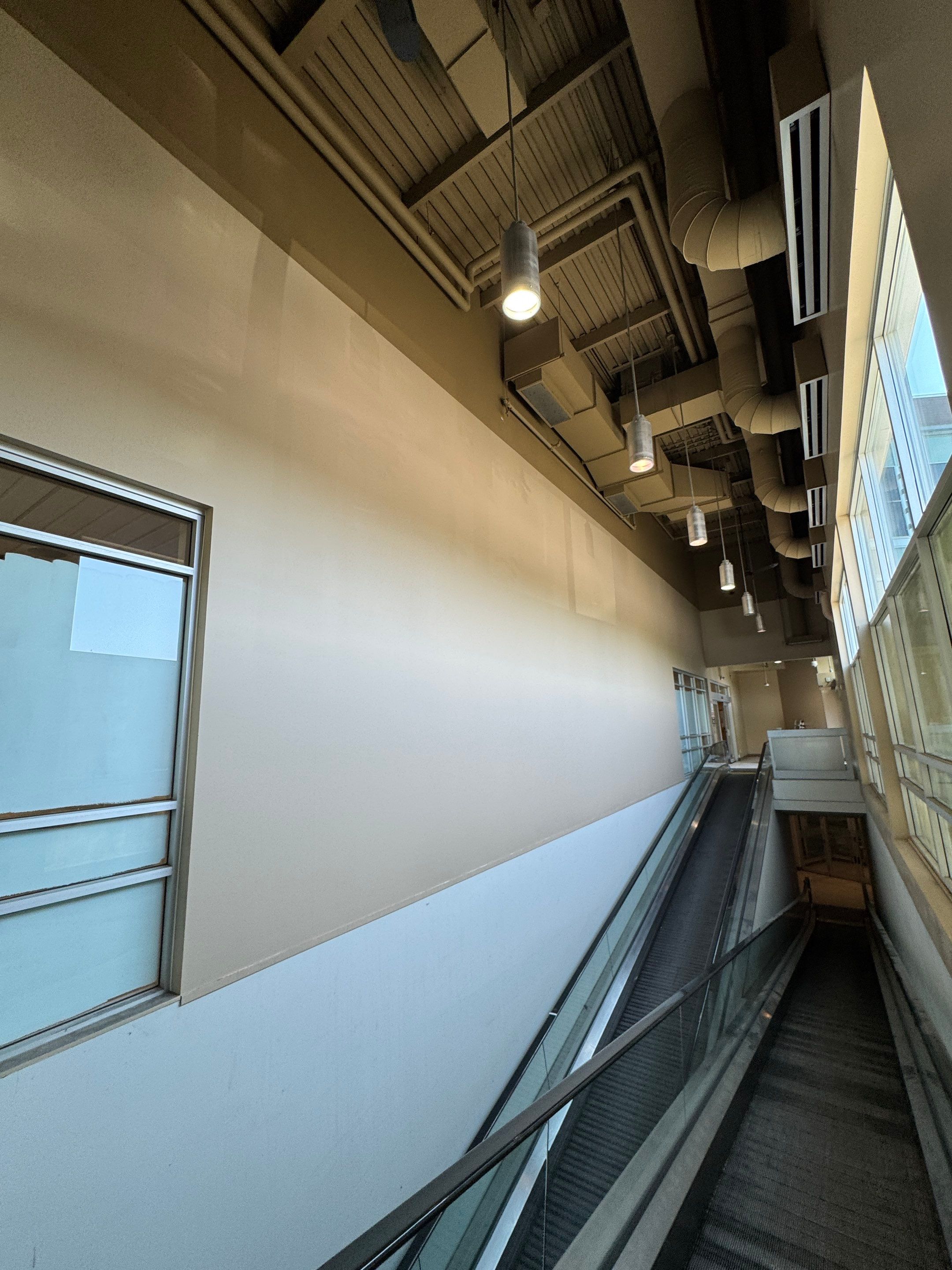 Commercial Prime & Paint Project-30ft height by YVR Construction Group
