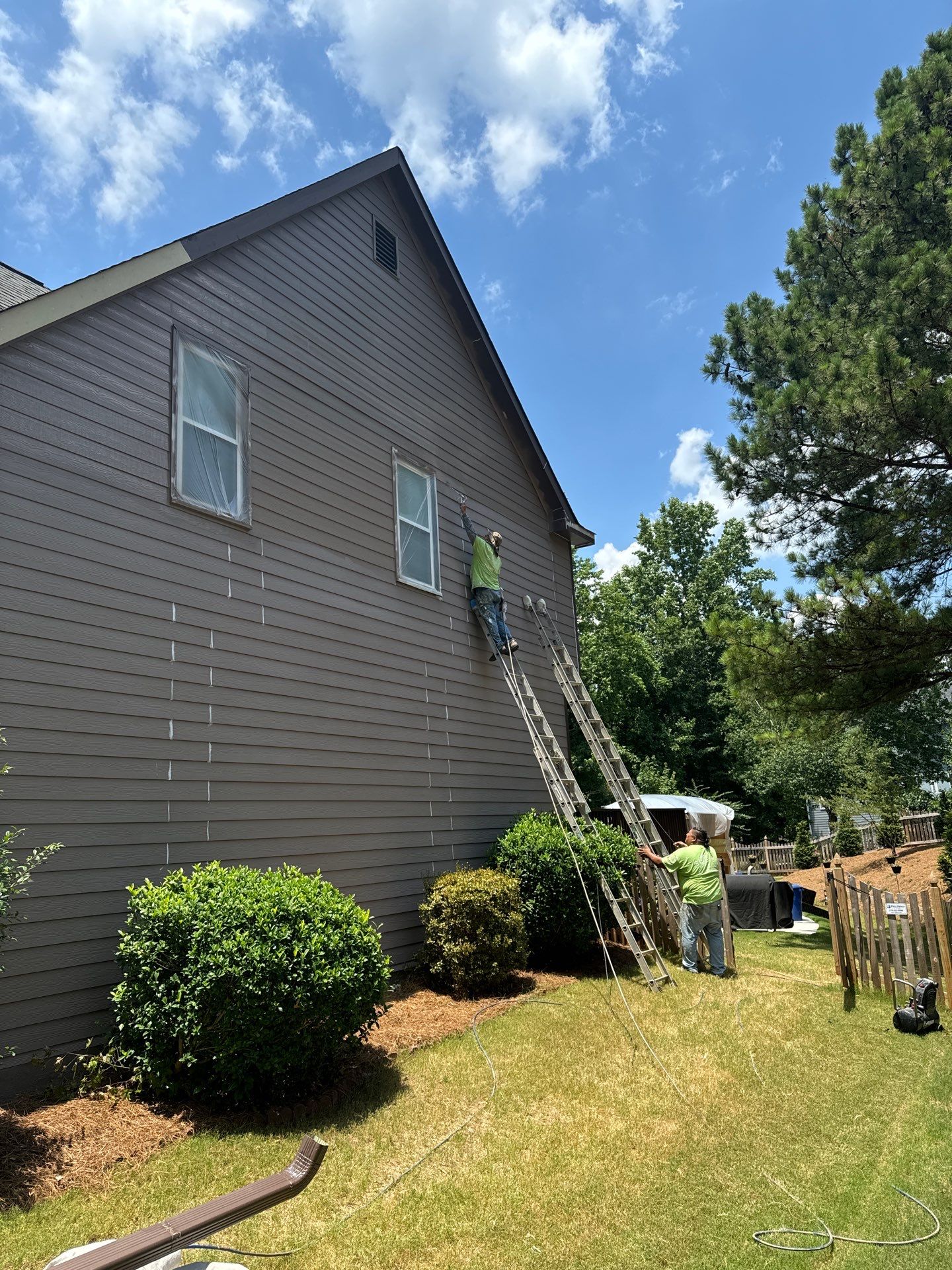 Full Exterior Painting and Gutter Replacement for Powder Springs Home by Swift Home Renovations