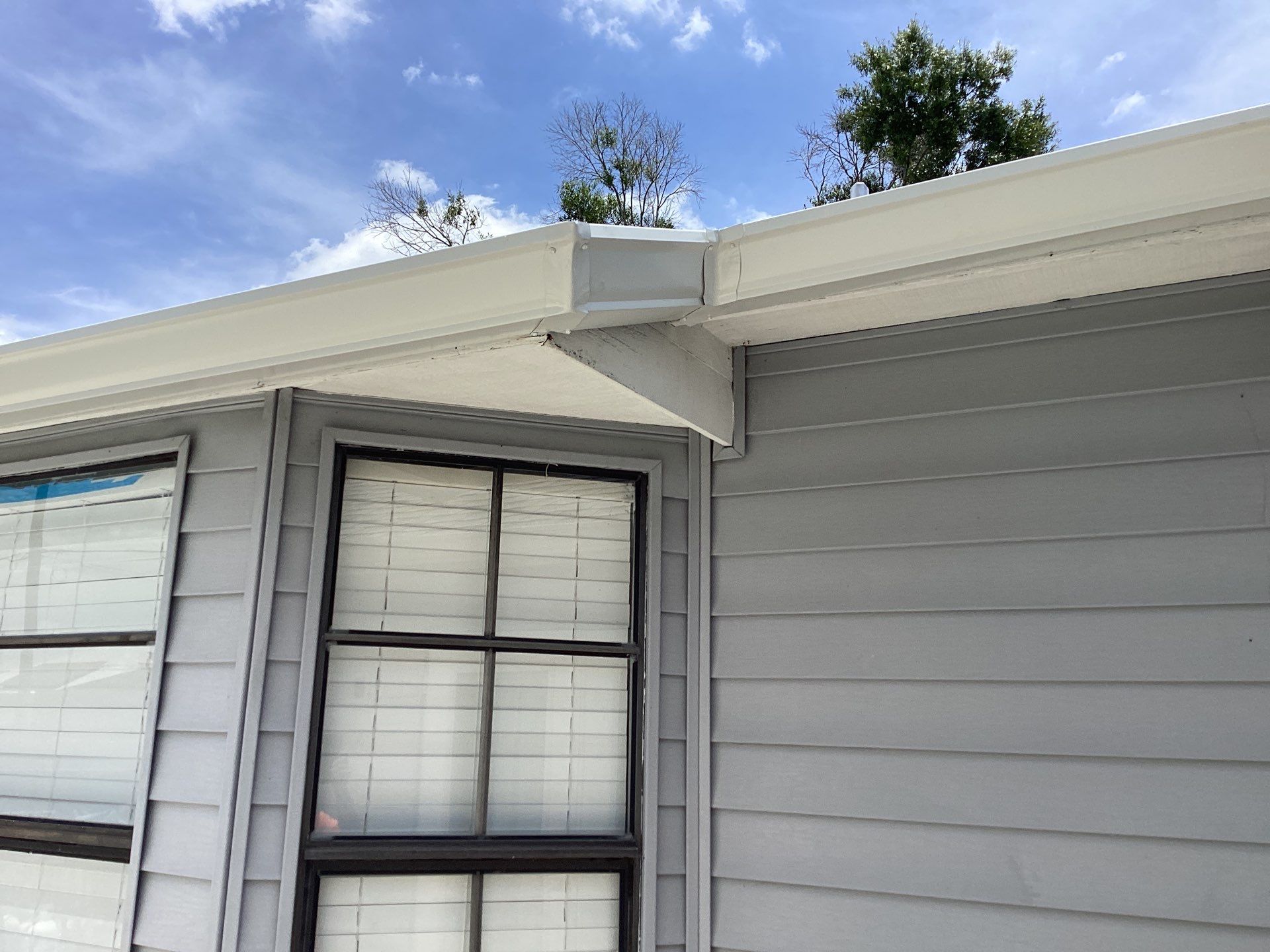 Aluminum Seamless Gutters using Splash Guard in Cape Coral FL by Gutter Professors