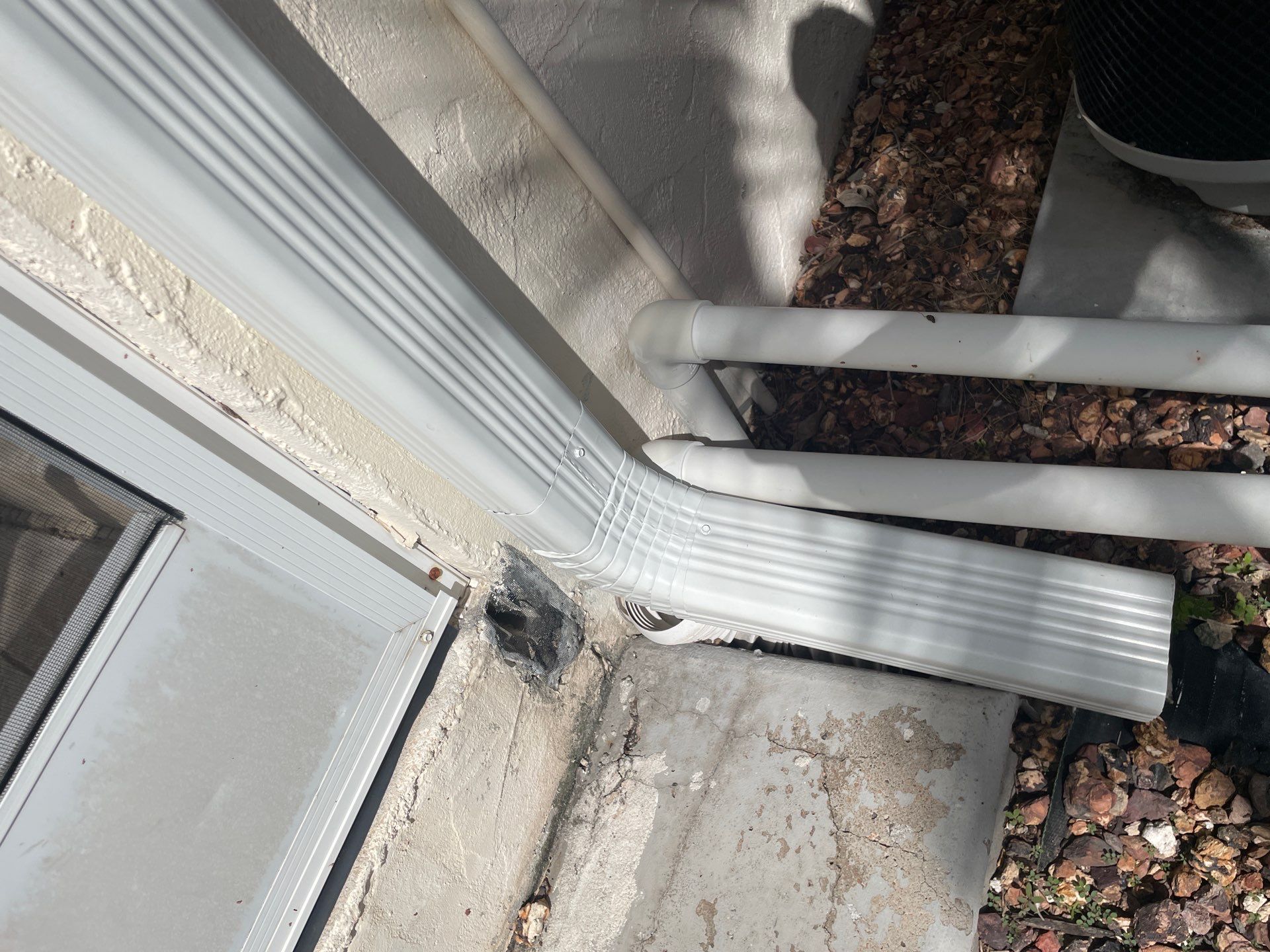 Connect Downspouts to Drain in Punta Gorda FL by Gutter Professors