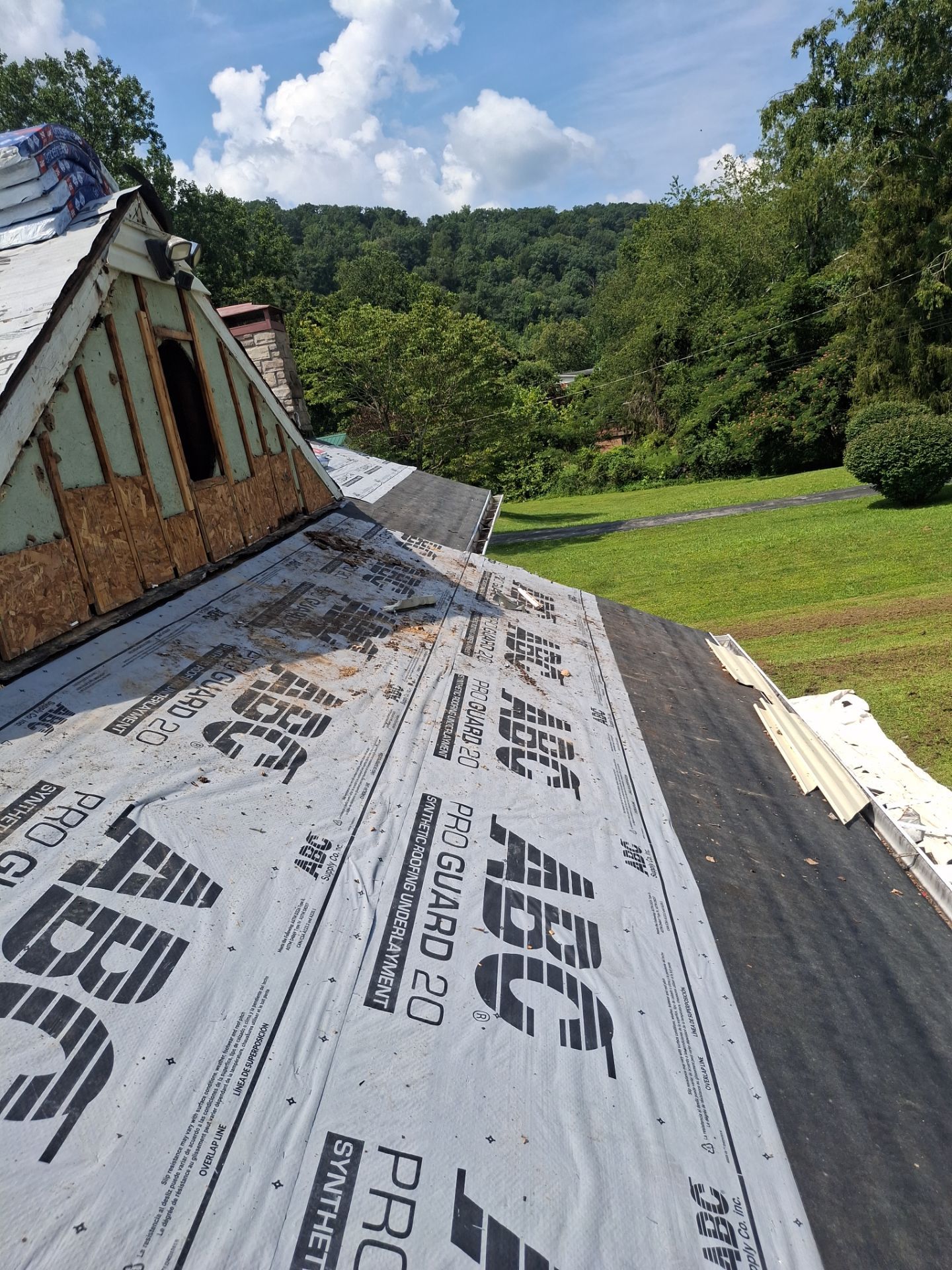 Residential Roofing Installation using GAF Timberline HDZ Weatherer Wood by Rainstoppers Roofing