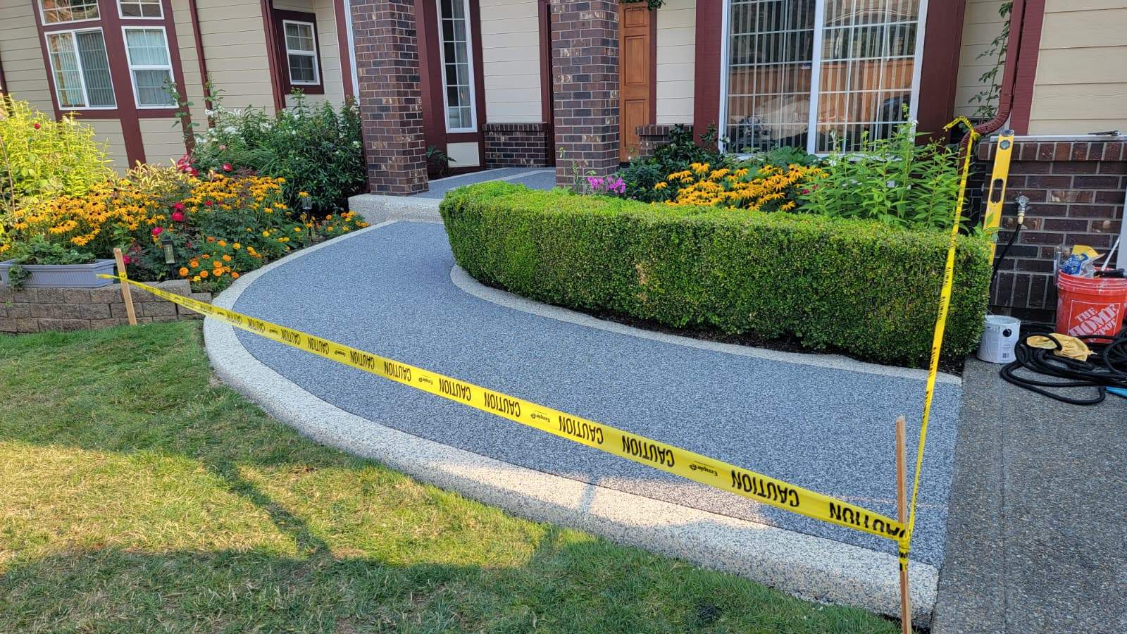 Elegant Walkway and Patio in Palazzo and Santorini Vuba Stone  by Concrete Coating Experts Inc.