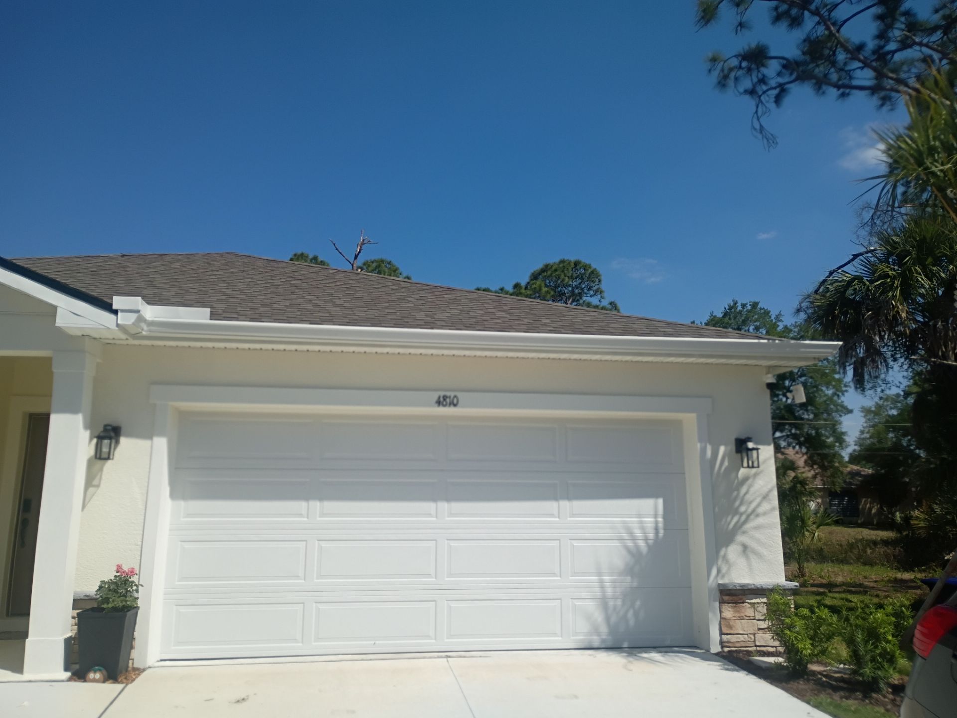 6-inch K-style White Seamless Gutters with Downspouts in North Port, FL by Gutter Professors