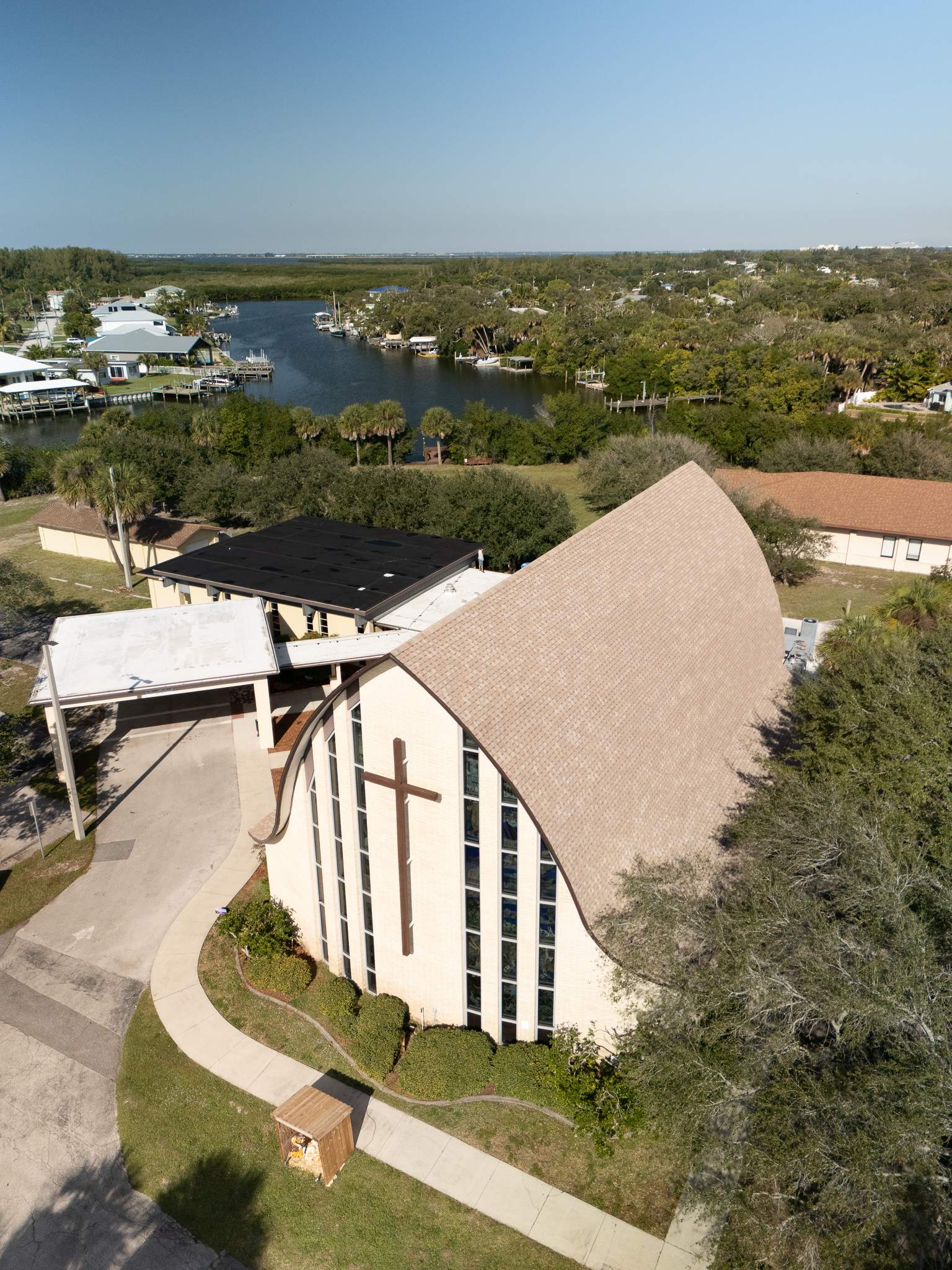 Multi-Surface Roof Replacement for Local Church in Cocoa Beach, Florida by Wiedmann Construction & Roofing