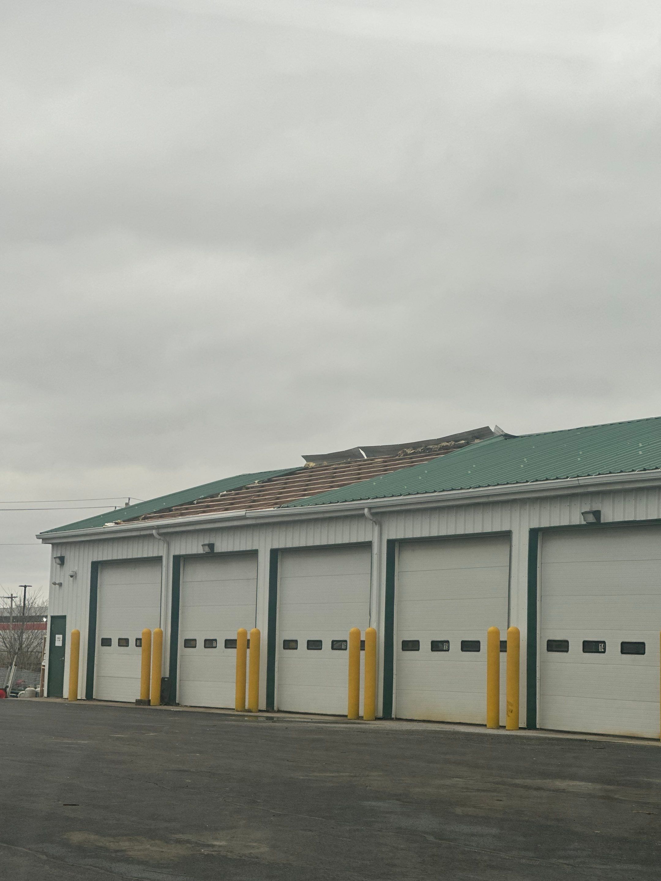Commercial Roofing Repair using Ag panel green  by Nitro Roofing and Construction