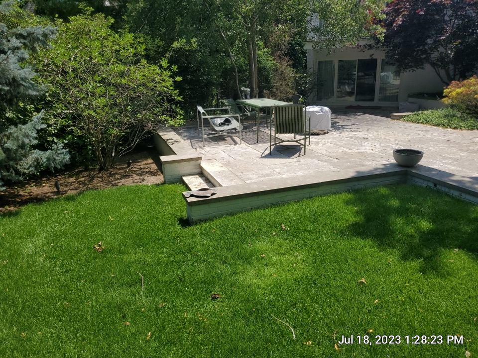 marble patio cleaning and sanding using Polysweep polymeric sand by Northern Power Washing LLC.