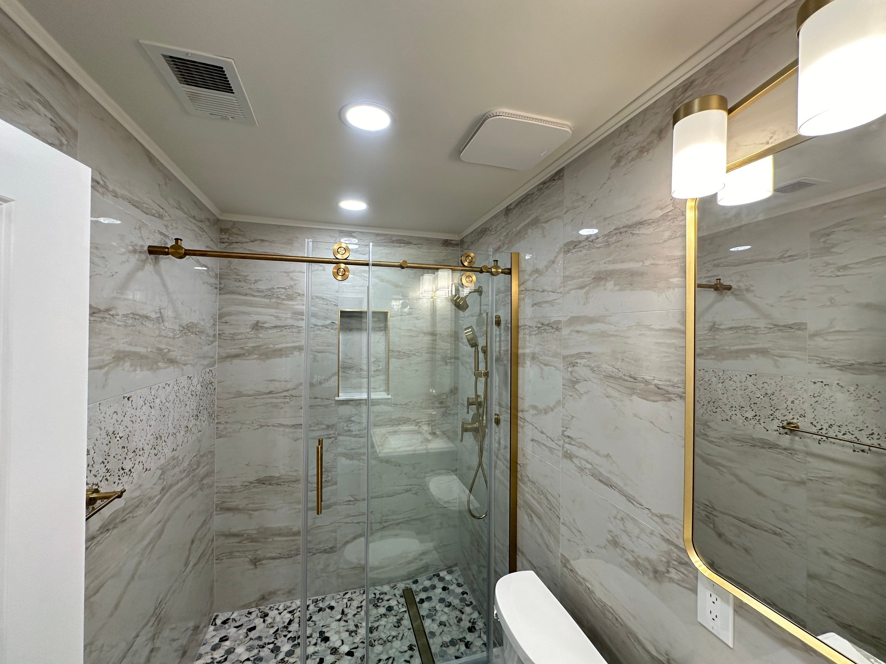 Bathroom Remodel using Tile by Home Concepts Construction