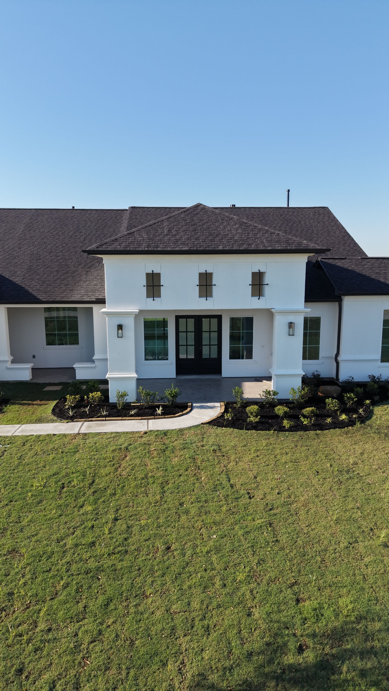 Custom Stucco Masterpiece with Precision Foam Detailing – Waller, TX by Apex Conventional Stucco Llc