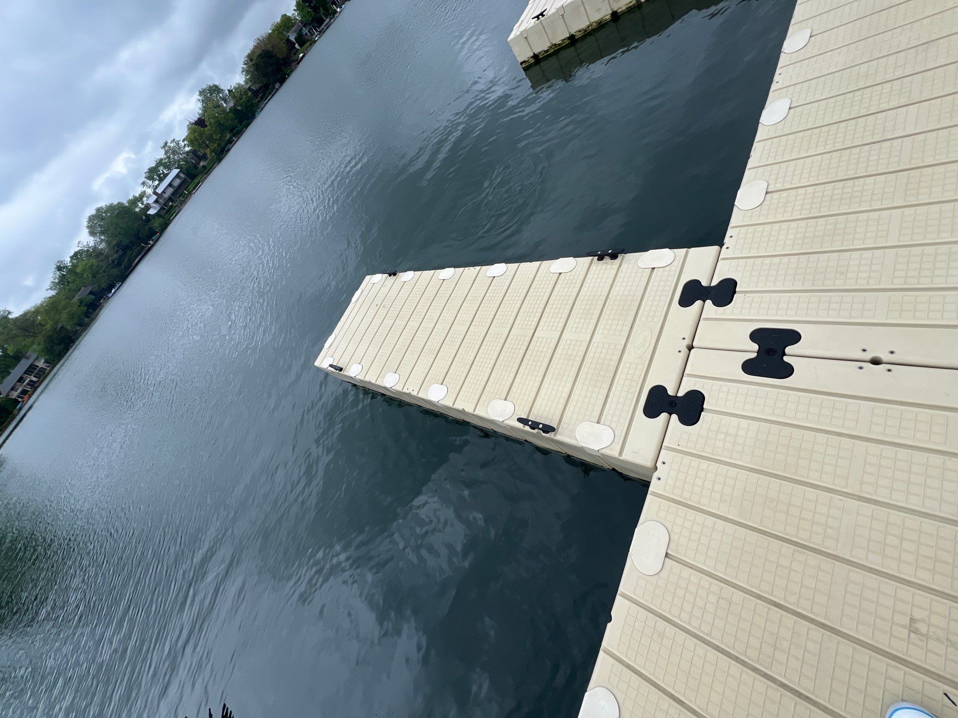Power washing of floating dock by Northern Power Washing LLC.