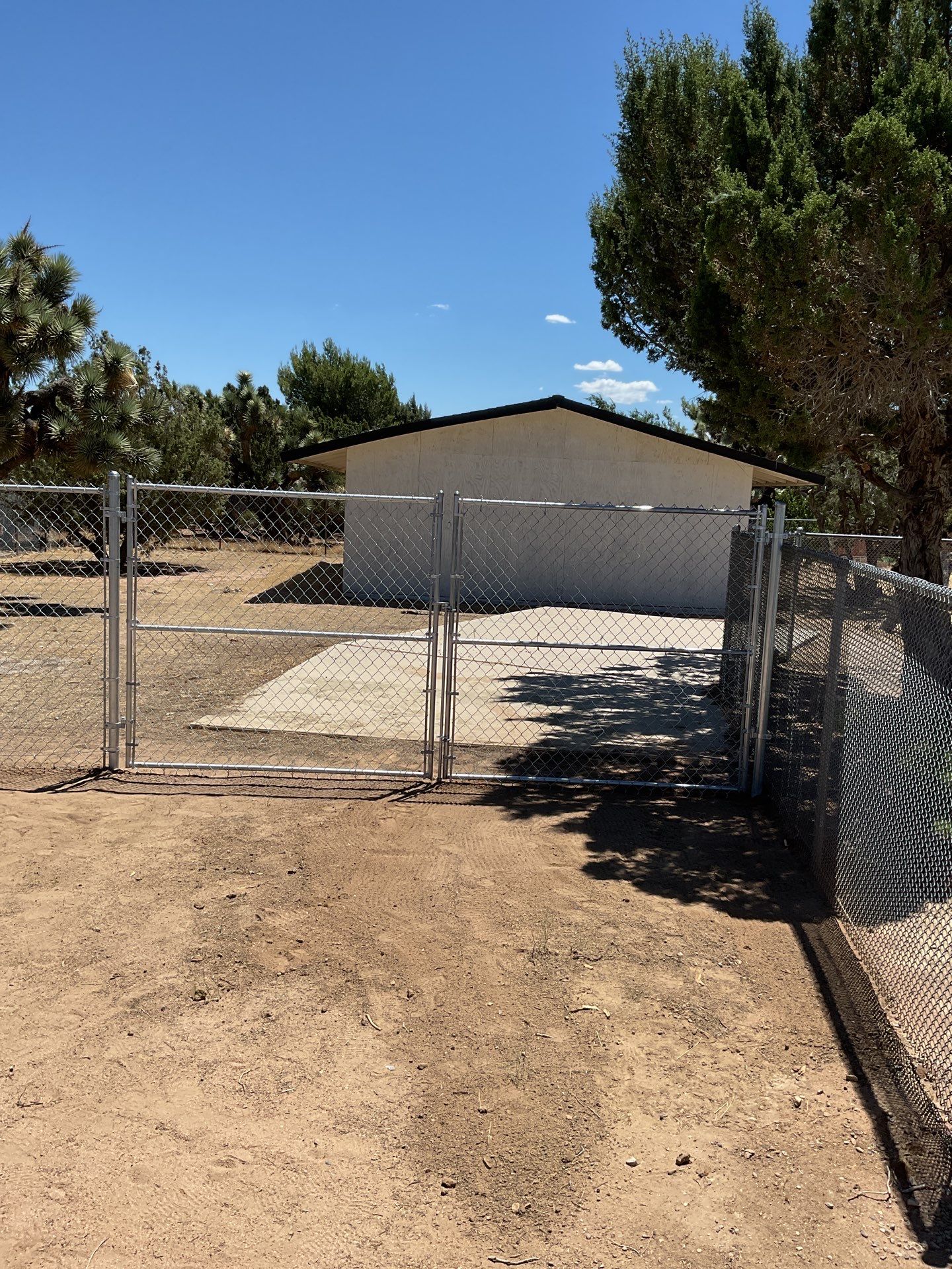 Chain link gate installation using chain -link by Fence Guys Inc. 
