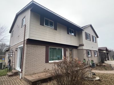 Siding Replacement using CertainTeed Monogram D5 Clapboard