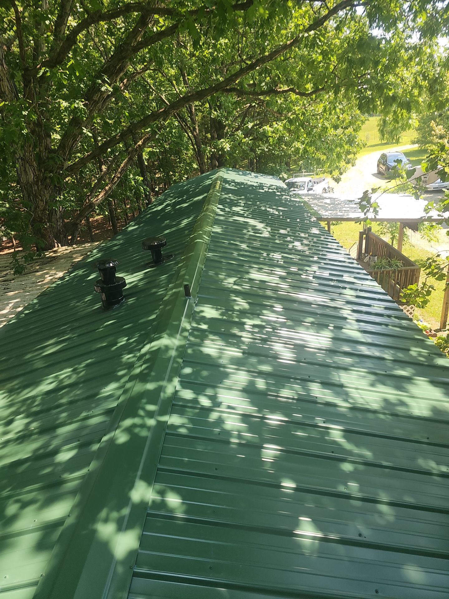 Residential Roofing Install - 26 Gauge G-Rib Metal - Color Evergreen  by Titan Commercial & Residential Roofing 