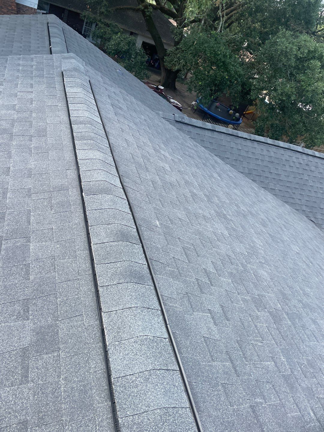 Residential Roofing Installation using Roof Replacement by American Roofing & Construction LLC