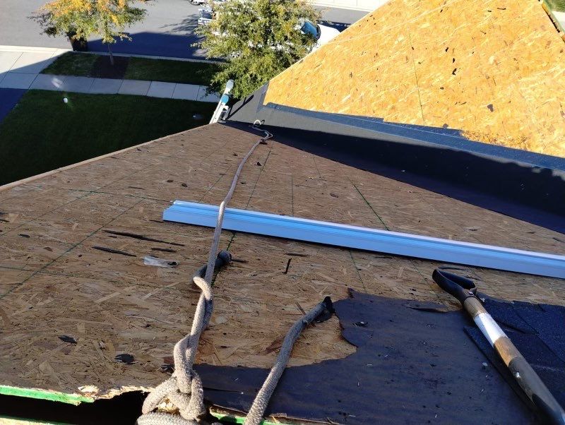 Residential Roofing Installation using Atlas Pinnacle Pristine Black Architectural Shingles by Frederick Roof Repair