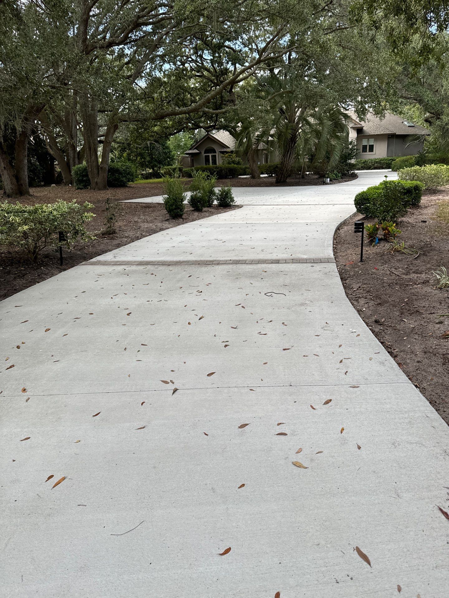 Custom Concrete Driveway with Decorative Paver Inlays in Hilton Head Island