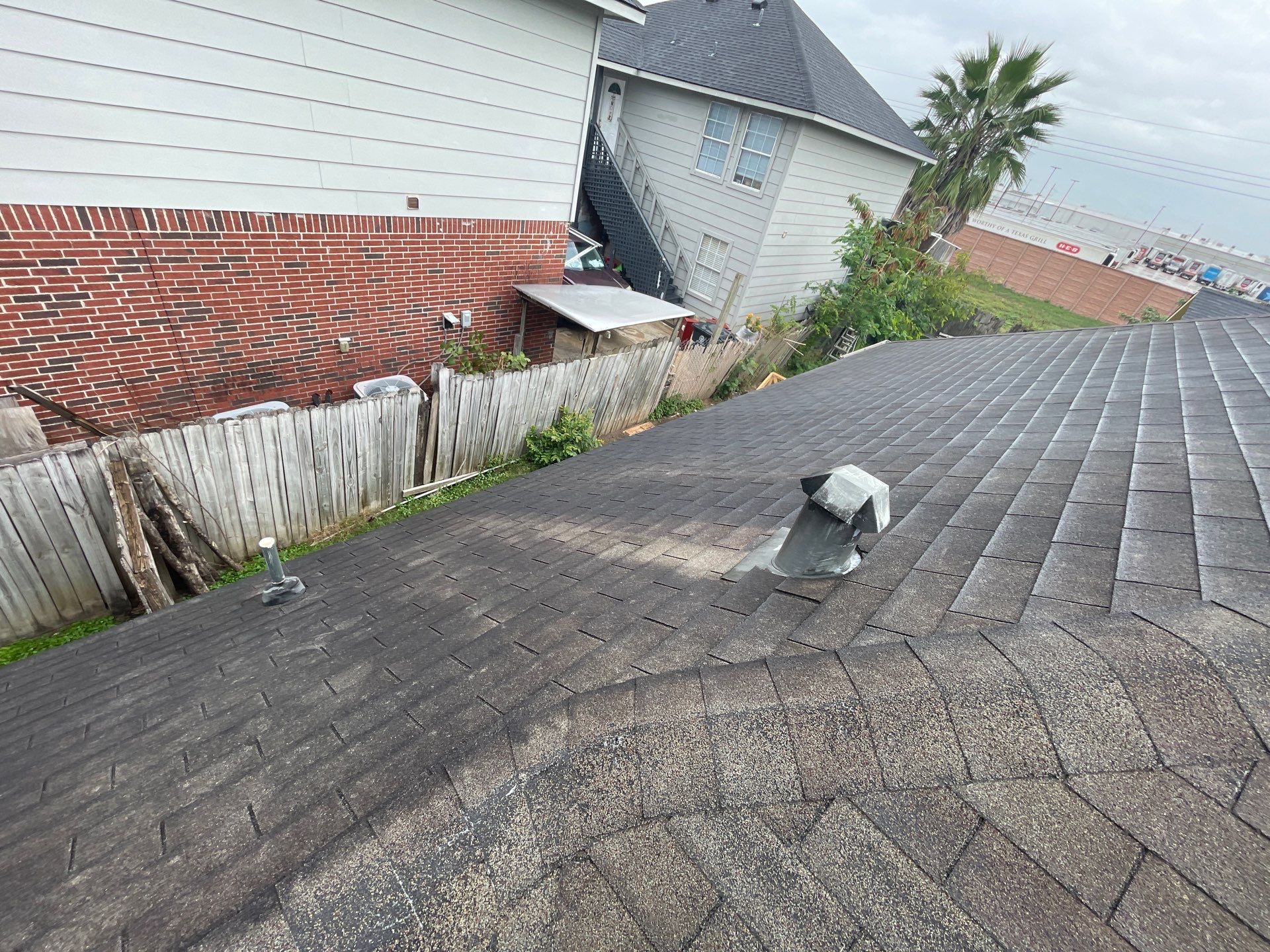 Roof Damage using Tamko Heritage® Series Rustic Black by CAP Roofing and Construction LLC