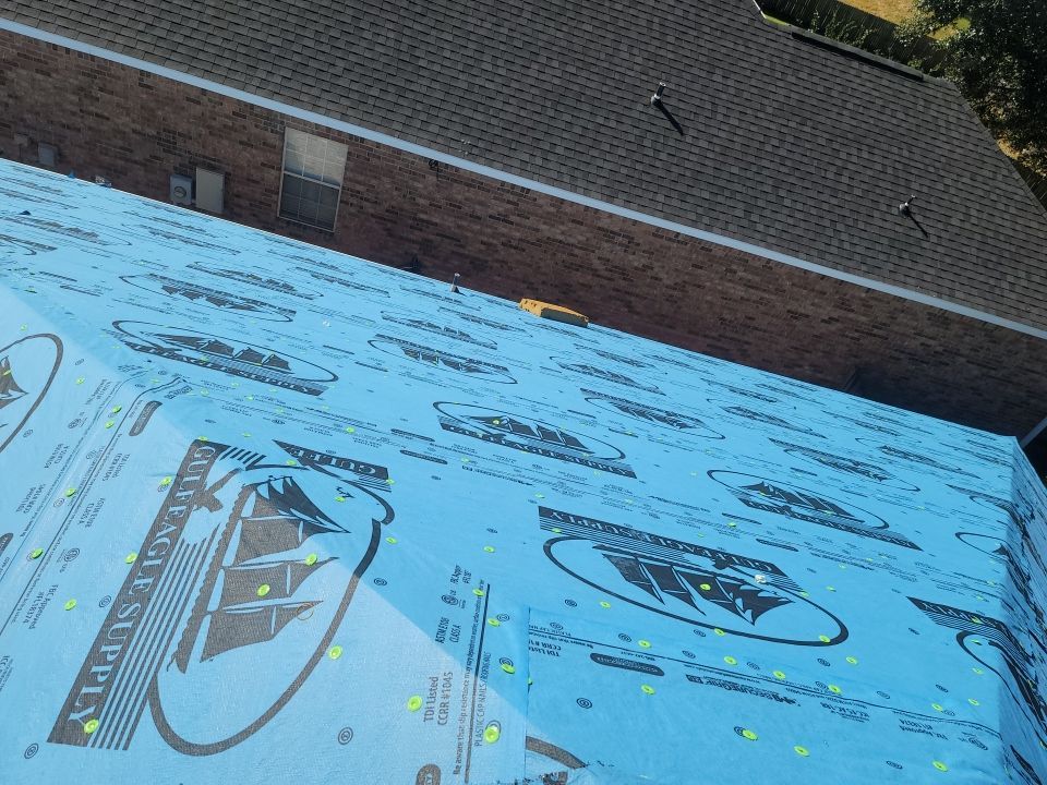 Residential Roofing Installation using Roof Replacement by American Roofing & Construction LLC