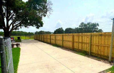 Dover, FL 6ft. Treated Board on Board Privacy Fence 