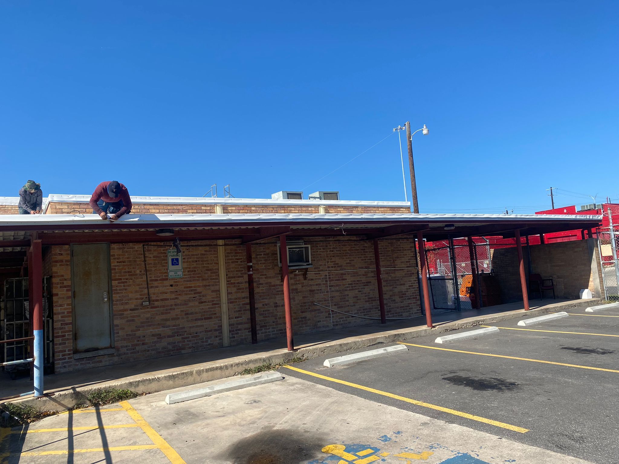 San Antonio Post Office Recover with a 20 year NDL warranty by Grell Roofing, LLC
