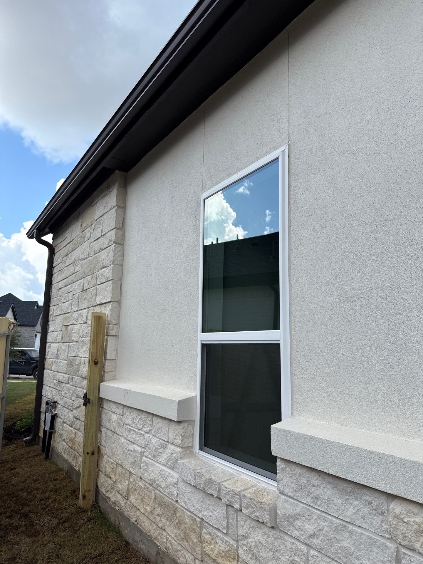 Magnolia Craftsmanship: Stucco and Foam Accents with Stone Integration by Apex Conventional Stucco Llc