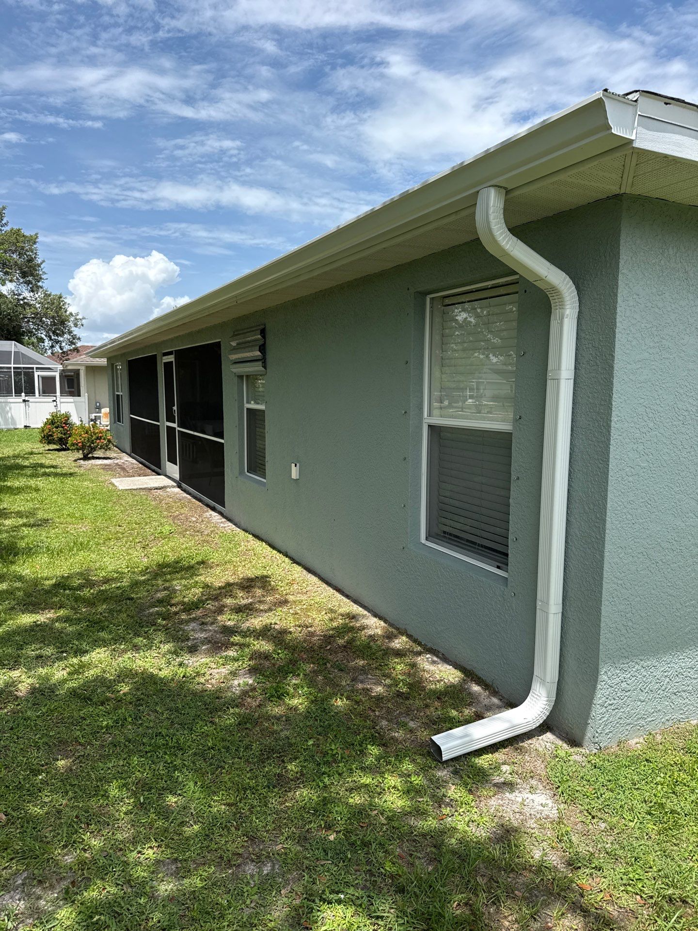 Gutter Guard and New Downspouts Installation in Punta Gorda FL by Gutter Professors