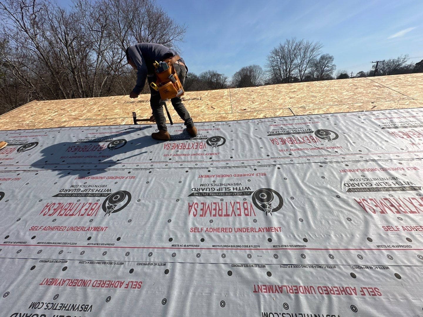 Residential Roofing Installation using Standing Seam Metal by Undersun Roofing 