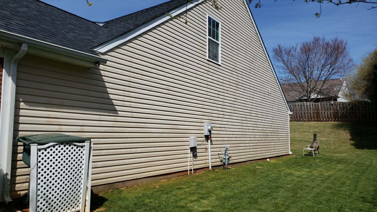 House Wash using cleaner by Power Wash Masters LLC