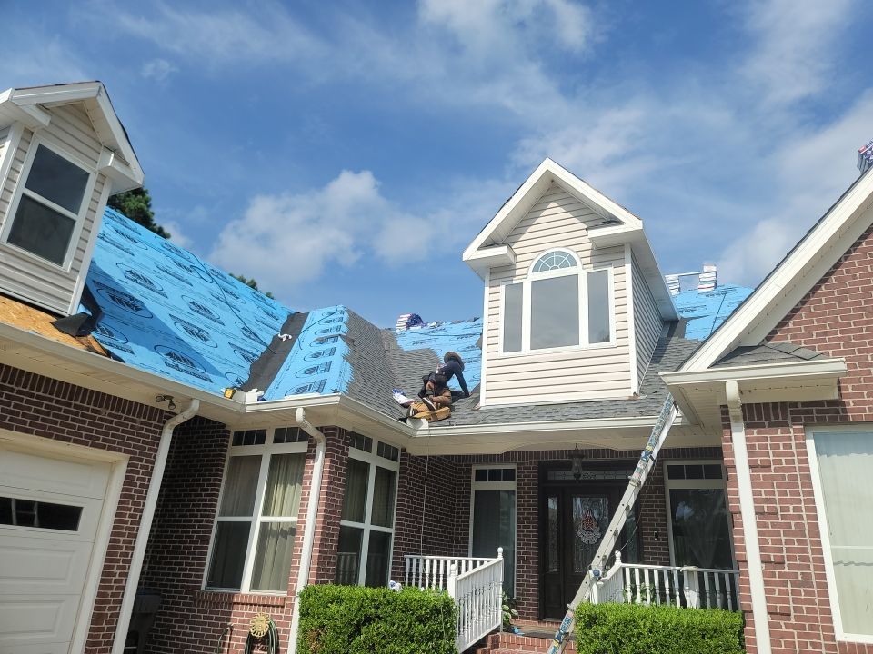 Residential Roofing Installation using Roof Replacement by American Roofing & Construction LLC