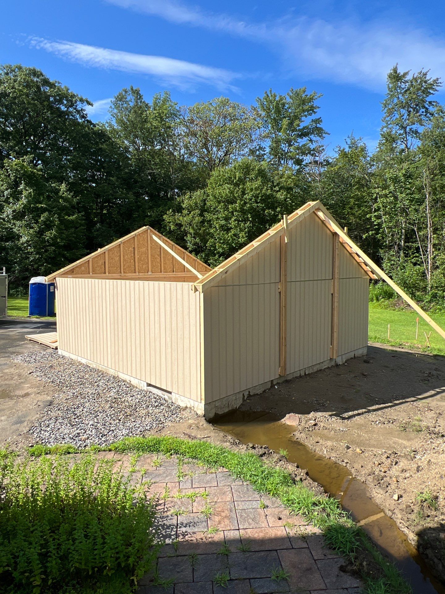 Two-Car Garage using LP SmartSide Panel Siding by Chagnon Building & Remodeling LLC