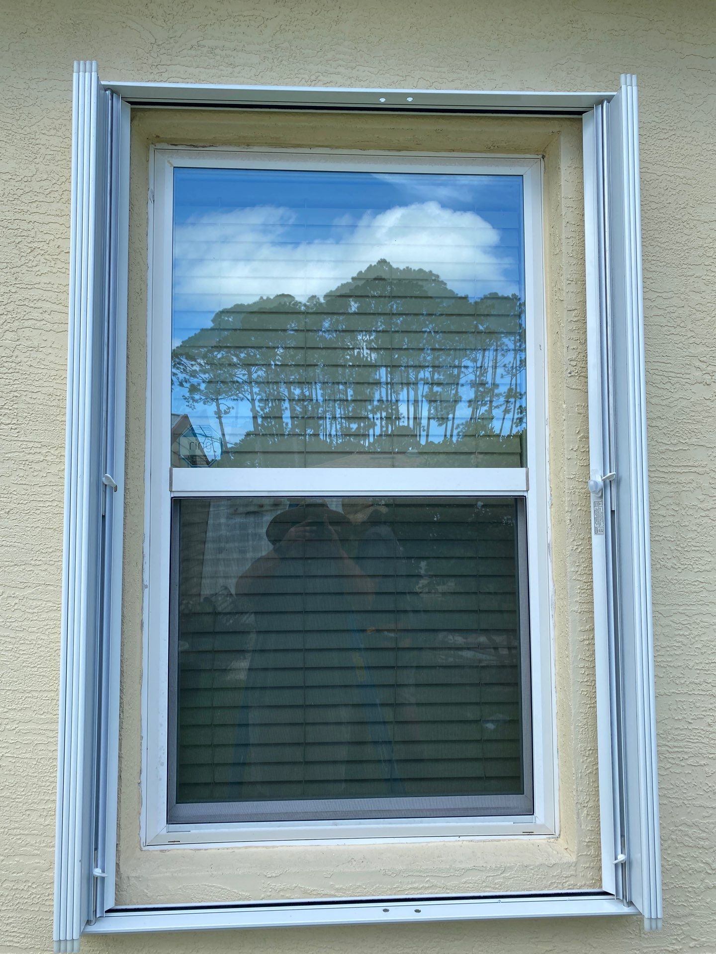 Accordions in White by Smart Guard Shutters