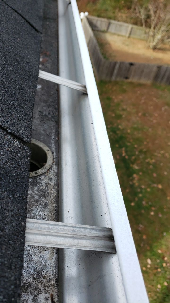 gutters and Driveway by Power Wash Masters LLC