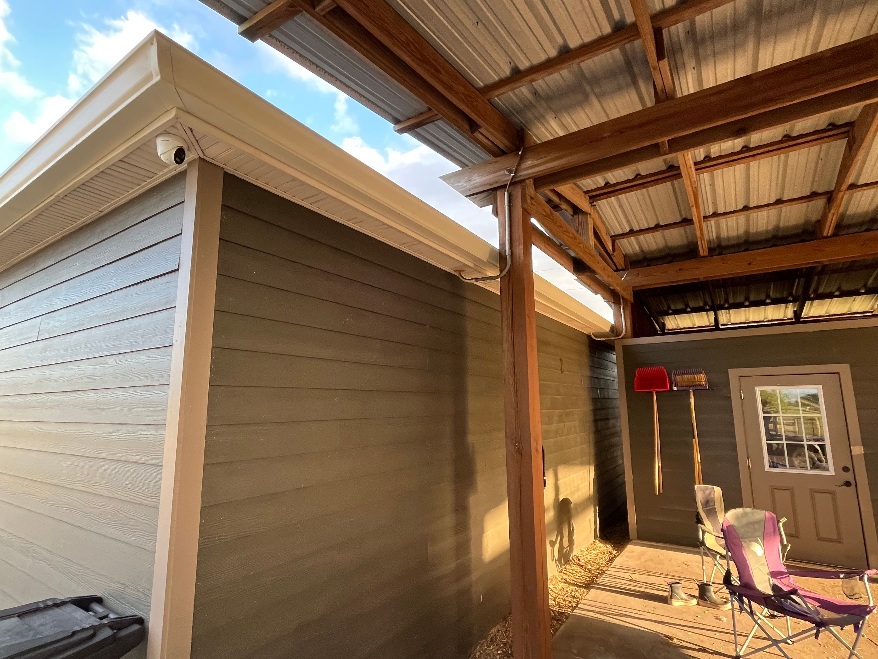  7-inch White seamless gutters and downspouts in Myakka City FL by Gutter Professors