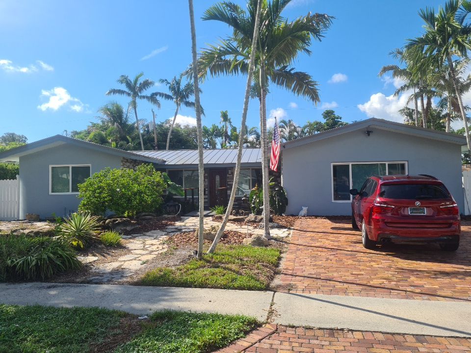 Residential Roofing Installation using 1" Nail strip metal roof by BLUES BROTHERS CONSTRUCTION CORP