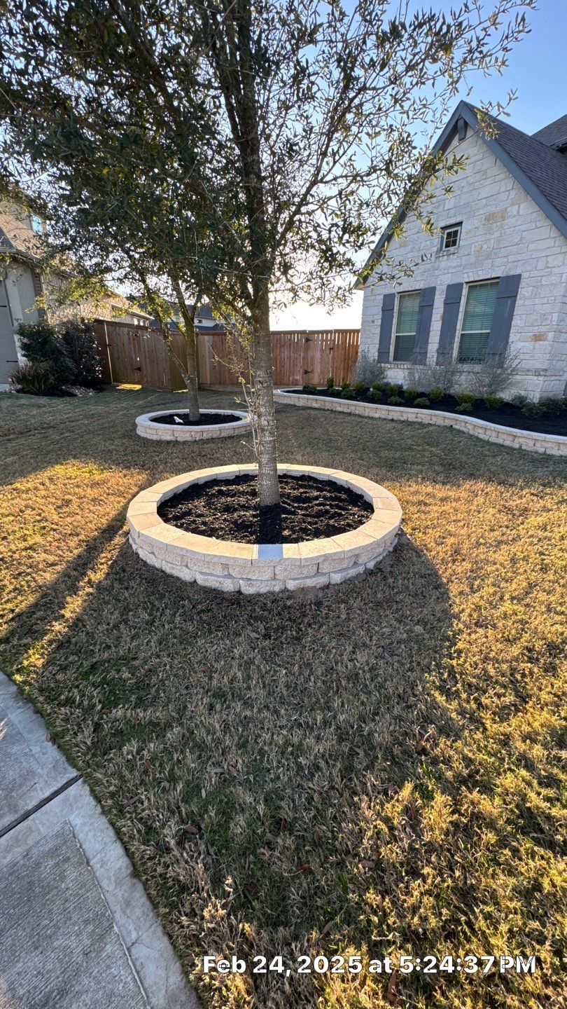 🌿✨ Darlene & Andrew’s Amazing Curb Appeal Transformation  Some projects are more than just landscaping—they’re a conversion of curb appeal from the ground up. For Darlene & Andrew, Alejandro and the Texas Urban Team designed and delivered a complete solution that reshaped their flower beds, solved drainage challenges, and gave new life to the sideyard.  💡 From planning to execution, every step was tailored to build both beauty and functionality:  🌸 Flower Beds, Reinvented  Demolition of old beds, plants, and mulch.  Fresh soil preparation, weed protection, and a brand-new retainer wall built with hand-cut stone and decorative caps.  Carefully selected plants and garden mix to ensure health and visual harmony.  💧 Drainage & Irrigation Upgrades  Outdated corrugated pipes replaced with PVC drainage lines to carry water safely away from the foundation.  New irrigation system combining drip lines and sprinklers—watering plants while keeping the house walls protected.  Sideyard drainage extended with catch basins and PVC piping to prevent water pooling and foundation stress.  🚶 Functional Sideyard with Walkway & Trash Area  Graded and leveled sideyard to manage runoff.  Installed a modern gravel and paver walkway for easy access.  Built a firm and tidy concrete-paver pad for trash containers—making the space both practical and polished.  🛠️ Stonework & Craftsmanship  Every stone in the retainer wall was cut, set, and secured by the team of handcrafters, ensuring a durable build that doubles as a design statement.  ✅ Outcome: Darlene & Andrew’s property now has better drainage, a clean and organized sideyard, and elegant new flower beds—all designed for long-term durability and lasting beauty.  📢 Before hiring anyone, review our portfolio. Our work speaks louder than words—each project is a blend of function, protection, and design crafted to last. by Texas Urban Elements