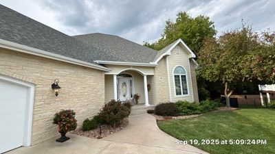 Storm Damaged Roof & Gutter Replacement
